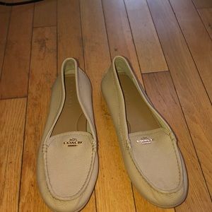 Tan coach slides